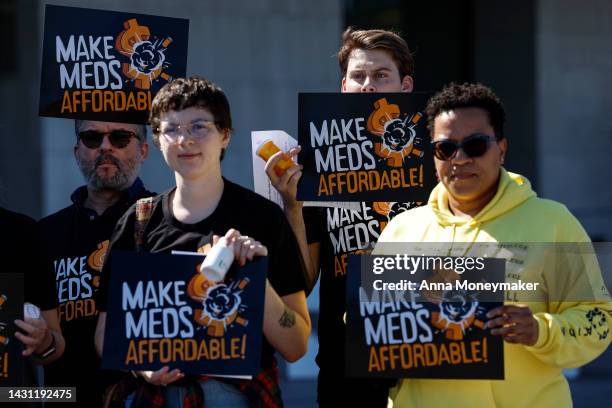 Activists protest the price of prescription drug costs in front of the U.S. Department of Health and Human Services building on October 06, 2022 in...