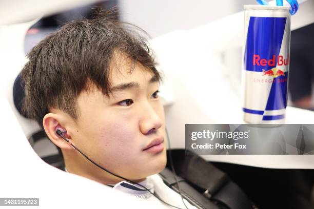 Yuki Tsunoda of Japan and Scuderia AlphaTauri prepares to drive in the garage during practice ahead of the F1 Grand Prix of Japan at Suzuka...