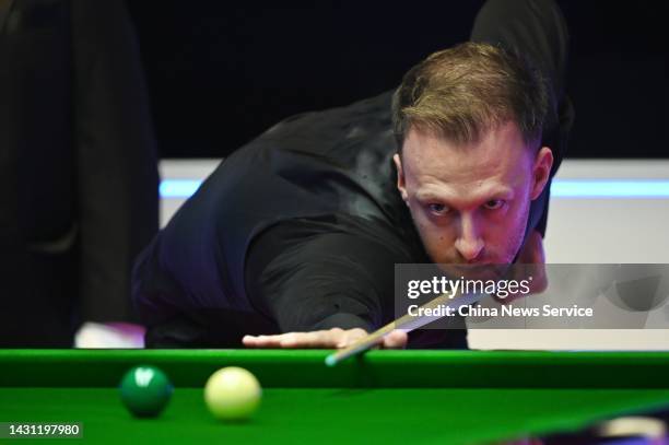 Judd Trump of England plays a shot in the quarter-final match against John Higgins of Scotland on Day 1 of Hong Kong Masters 2022 at Hong Kong...