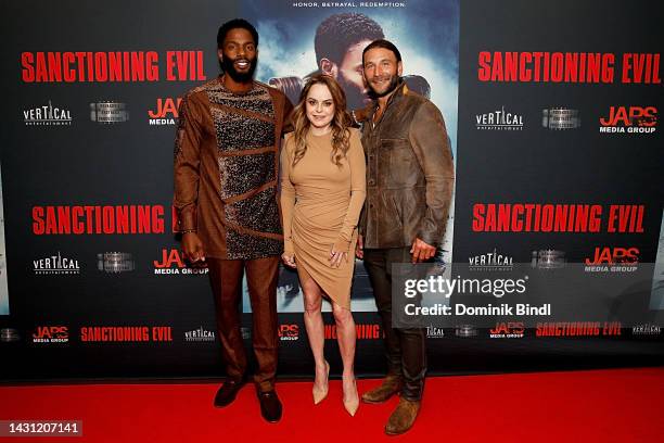 Tobias Truvillion, Taryn Manning and Zach McGowan attend the World Premiere of “Sanctioning Evil” at DGA Theater on October 06, 2022 in New York City.