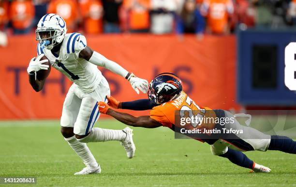 Parris Campbell of the Indianapolis Colts makes a catch in overtime during a game against the Denver Broncos at Empower Field At Mile High on October...