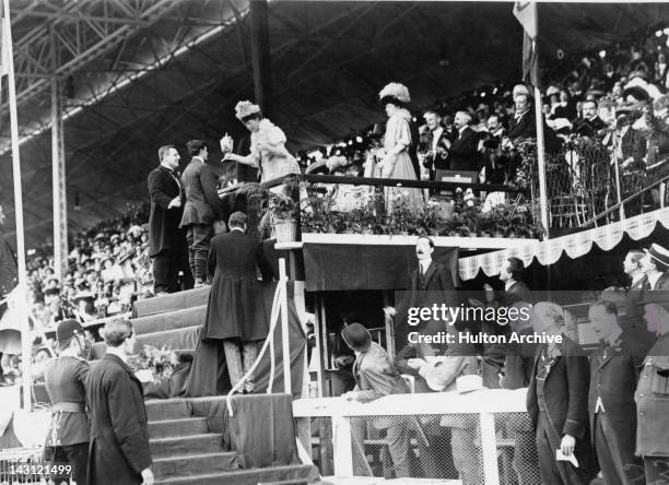 Queen Alexandra presenting Italian athlete Dorando Pietri with a special Gold Cup after he was disqualified from the Marathon at the 1908 London...