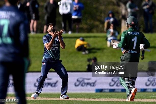 Haris Rauf of Pakistan catches the wicket of Sabbir Rahman during game one of the T20 International series between Bangladesh and Pakistan at Hagley...