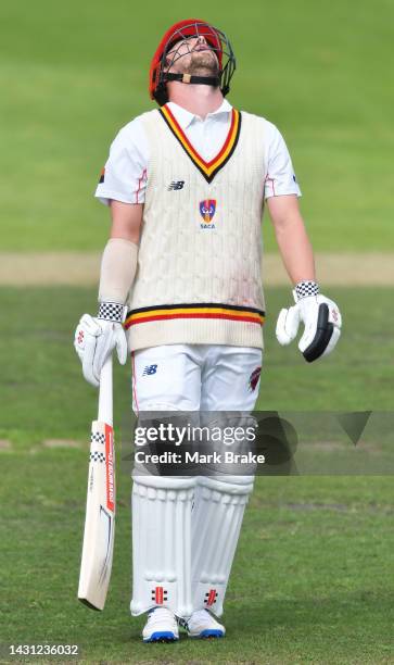 Travis Head of the Redbacks leaves the ground after getting out to Fergus O'Neill of the Bushrangers during the Sheffield Shield match between South...