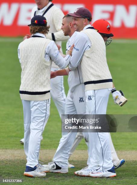 Fergus O'Neill of the Bushrangers celebrates the wicket of Nathan McSweeney of the Redbacks during the Sheffield Shield match between South Australia...