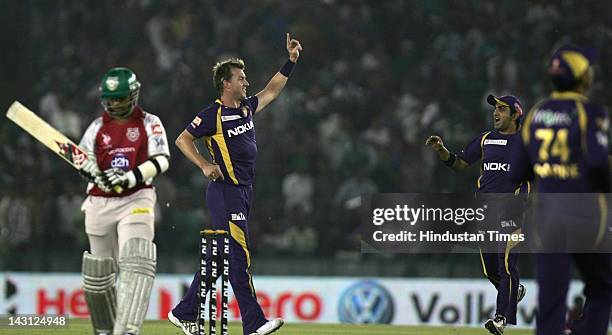 Kolkata Knight Riders bowler Brett Lee celebrates capturing the wicket of Kings XI Punjab Batsman Paul Valphaty during the IPL20 match between Kings...