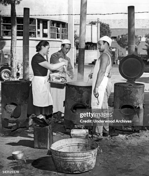 Cinecitta, the fabulous movie making center built by Mussolini, now serves as a refugee camp in post war Italy, Rome, Italy, August 23, 1947. Here...