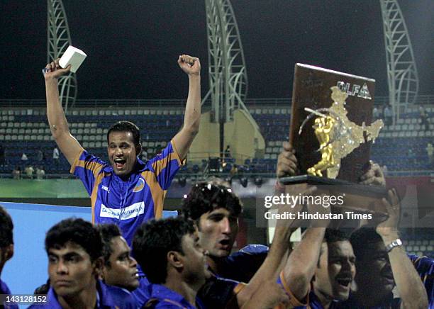 The Rajasthan Royals team celebrate with the IPL trophy after their win over Chennai in the final of IPL 1 at D.Y. Patil stadium on June 1, 2008 in...