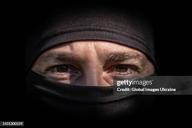 The eyes of a Special Forces fighter are seen before a daily counterattack in the Kherson direction on September 24, 2022 in Mykolaiv Oblast,...
