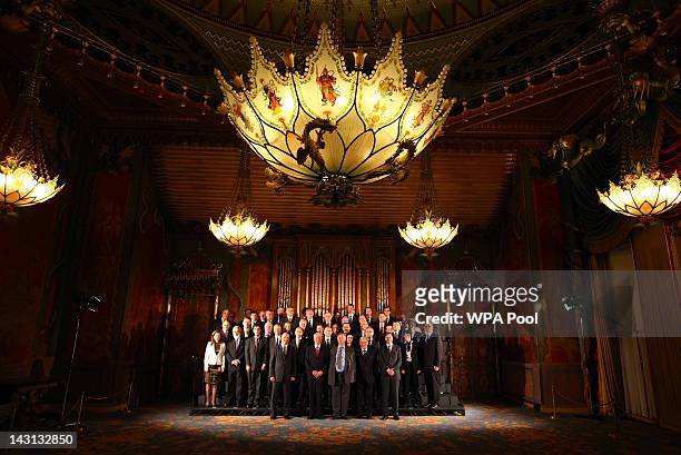 Justice Secretary Ken Clarke poses with the 47 members of the Council of Europe for a family photograph at the Royal Pavilion, during the Council of...