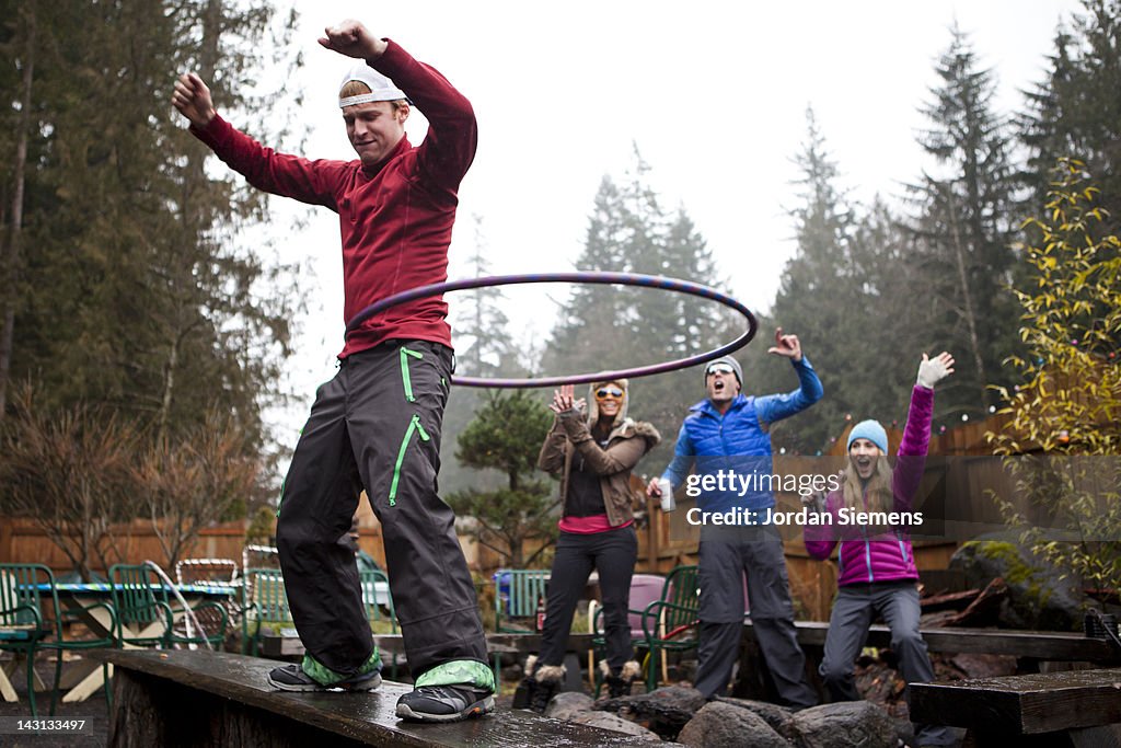 Friends hula hoop.