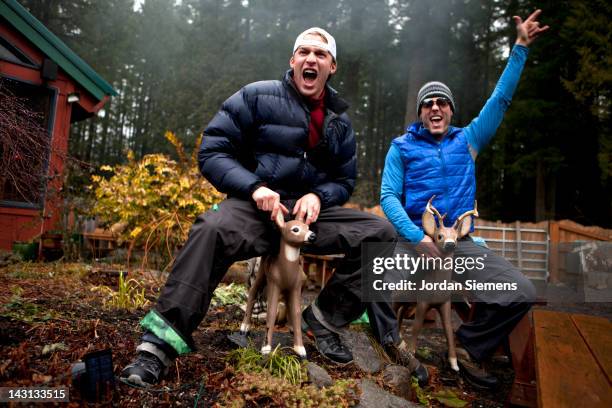 deer riding men. - newfriendship stock pictures, royalty-free photos & images