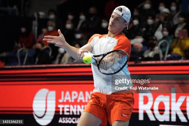 Dennis Shapovalov of Canada hits a return shot agains Coric of BornCroatia during on day five of the Rakuten Japan Open at Ariake Coliseum on October...