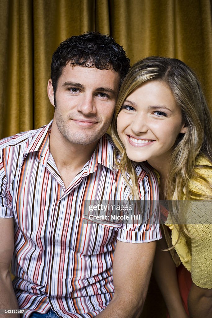 Couple in photo booth smiling