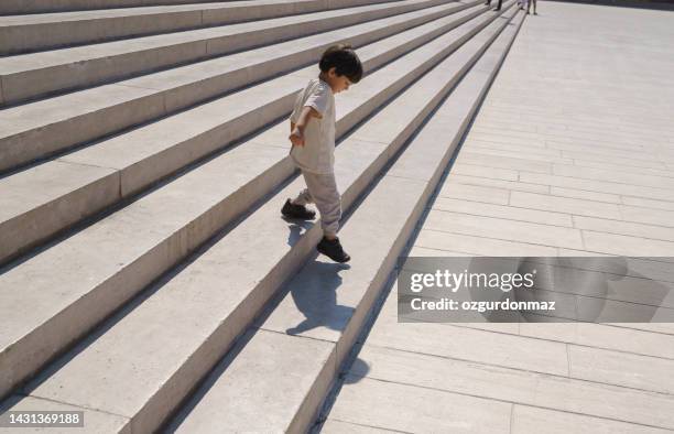 cute little boy playing on stairs at anitkabir, ankara,turkiye - ataturk mausoleum stock pictures, royalty-free photos & images