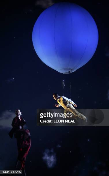 Artists from Canadian circus group, Cirque du Soleil perform "Delirium" onstage at the O2 arena in London, on April 17, 2008. The theme of Cirque du...