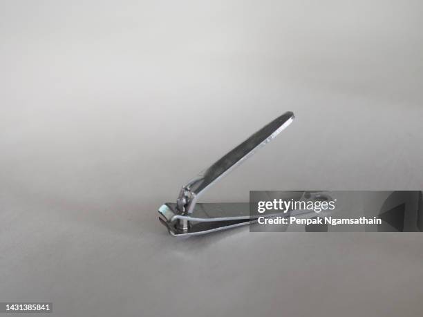 nail clippers on white background - fingernail stock photos et images de collection