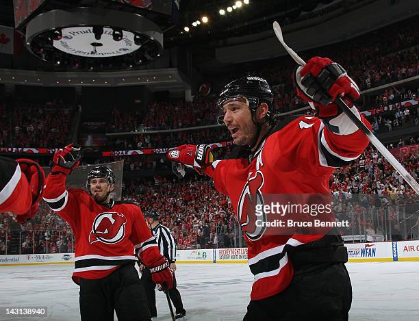 Marek Zidlicky and Ilya Kovalchuk of the New Jersey Devils celebrate a powerplay goal by teammate Zach Parise against the Florida Panthers at 6:08 of...