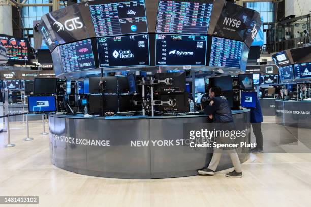 Traders work on the floor of the New York Stock Exchange on October 07, 2022 in New York City. Stocks fell in early trading on Friday as new...
