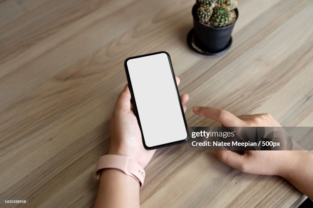 Using Phone Top View Top View Woman Sitting And Holding Blank Screen Mock Up Mobile Phone ...