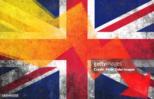 recession in the united kingdom - old uk flag stock-fotos und bilder
