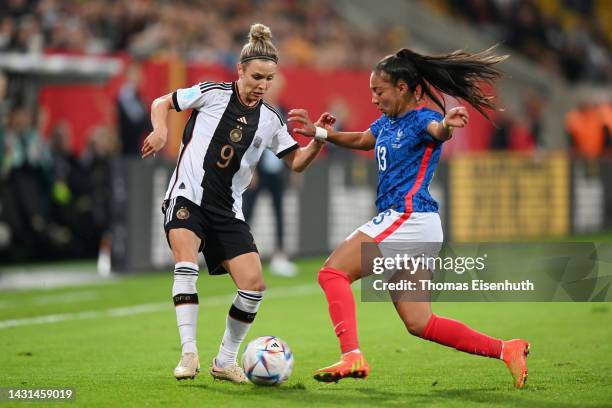 Svenja Huth of Germany battles for possession with Selma Bacha of France during the international friendly match between Germany Women's and France...