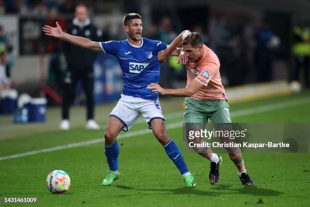 Andrej Kramaric of Hoffenheim battles for the ball with Niklas Stark of Werder Bremen during the Bundesliga match between TSG Hoffenheim and SV...