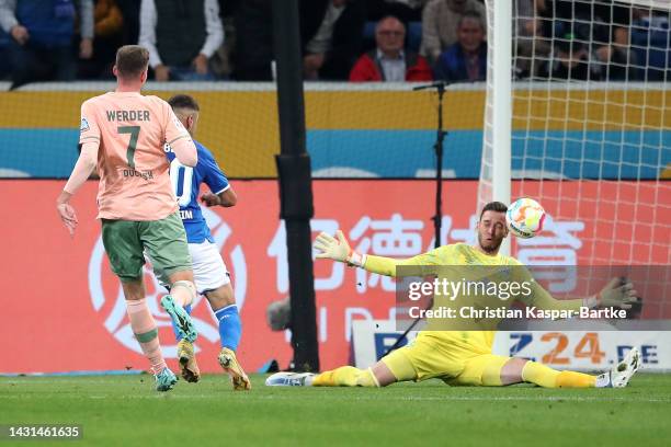 Munas Dabbur of Hoffenheim scores his teams first goal during the Bundesliga match between TSG Hoffenheim and SV Werder Bremen at PreZero-Arena on...