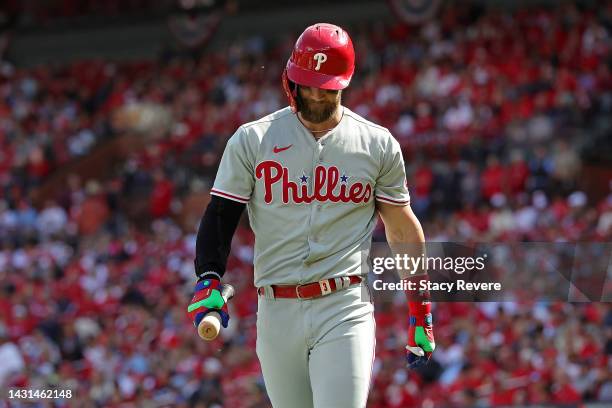 Bryce Harper of the Philadelphia Phillies reacts to a strike out during the fourth inning against the St. Louis Cardinals during Game One of the NL...