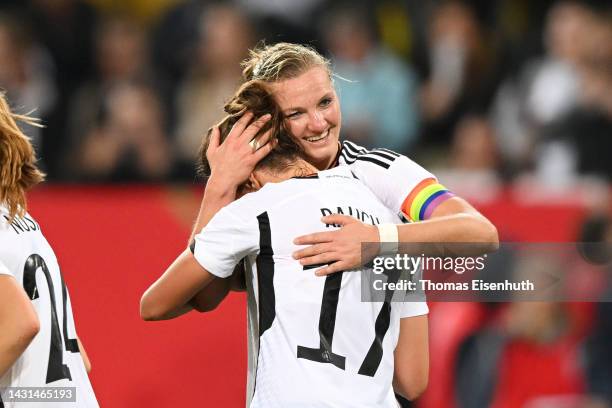 Alexandra Popp of Germany celebrates with teammate Felicitas Rauch after scoring their team's first goal during the international friendly match...