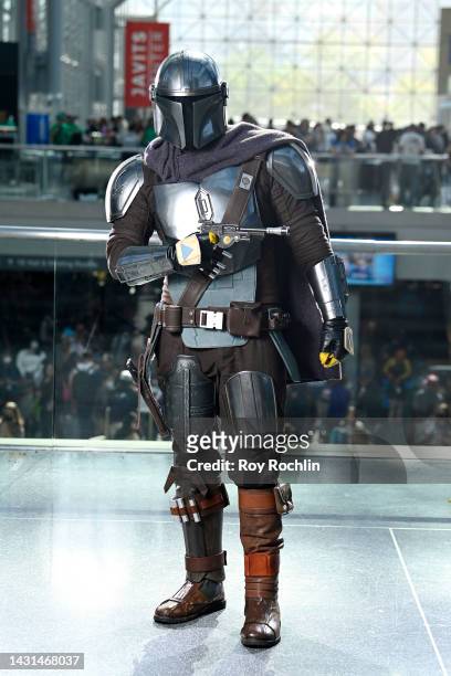 Mandalorian cosplayer poses during New York Comic Con 2022 on October 07, 2022 in New York City.