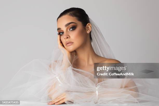 beautiful emotional woman with perfect make-up - bridal make up stock pictures, royalty-free photos & images