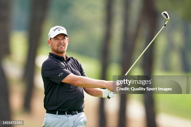 David Drysdale of Scotland watches his shot during Day Two of the acciona Open de Espana presented by Madrid at Club de Campo Villa de Madrid on...