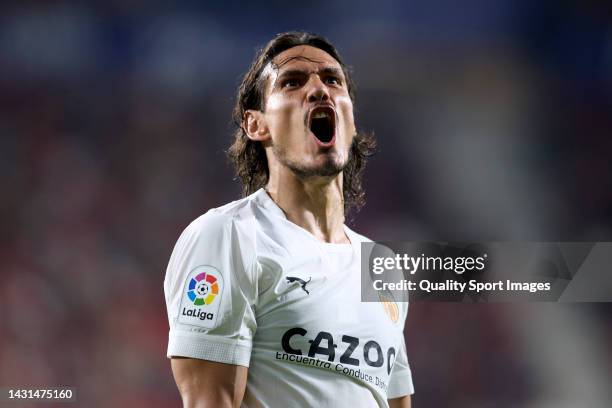 Edinson Cavani of Valencia CF celebrates his teammates goal Mouctar Diakhaby of Valencia CF during the LaLiga Santander match between CA Osasuna and...