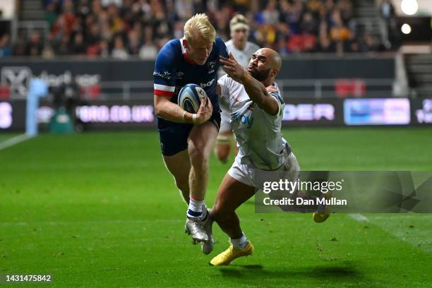 Toby Fricker of Bristol Rugby is tackled by Olly Woodburn of Exeter Chiefs during the Gallagher Premiership Rugby match between Bristol Bears and...