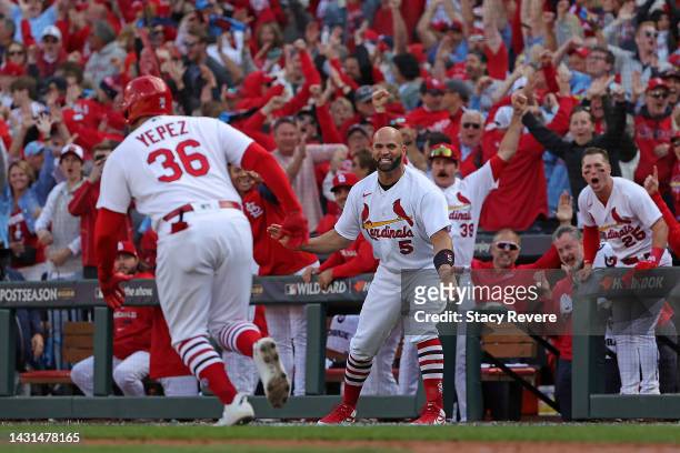 Albert Pujols of the St. Louis Cardinals reacts to a two run home run by Juan Yepez against the Philadelphia Phillies during the seventh inning of...