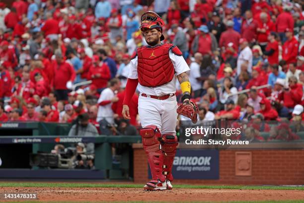 Yadier Molina of the St. Louis Cardinals walks to home plate during the seventh inning of Game One of the NL Wild Card series against the...