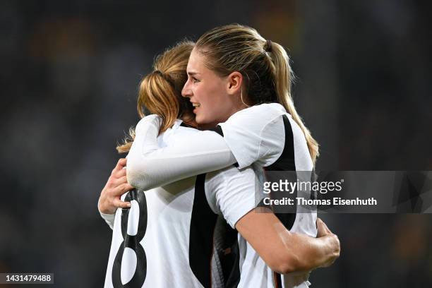 Sydney Lohmann and Jule Brand of Germany celebrate victory following the international friendly match between Germany Women's and France Women's at...