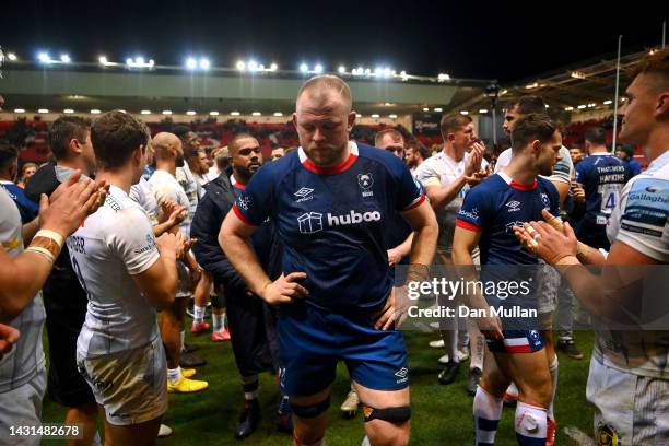 Joe Joyce of Bristol Rugby walks off the field after to applause from the players of Exeter Chiefs the Gallagher Premiership Rugby match between...