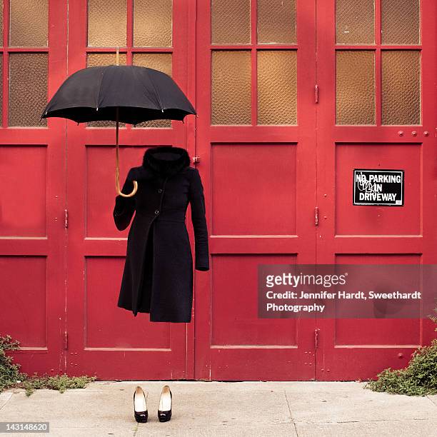 invisible woman with umbrella - invisible people stock pictures, royalty-free photos & images
