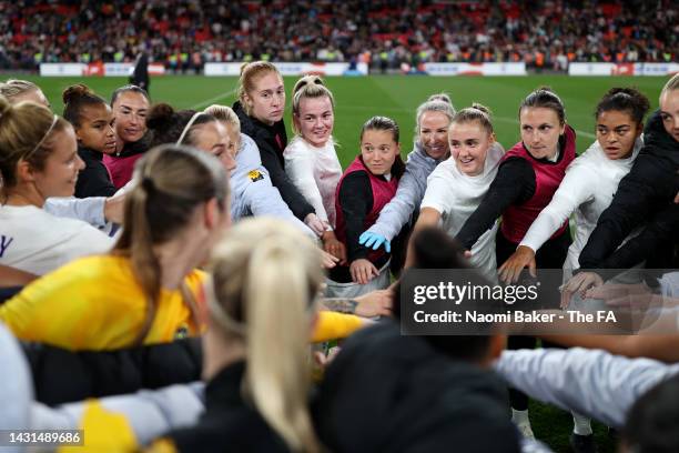 Players of England huddle following the Women's International Friendly match between England and USA at Wembley Stadium on October 07, 2022 in...