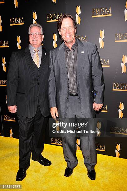 Brian Dyak of the Entertainment Industries Council and actor Kevin Sorbo arrive at the 16th Annual Prism Awards at the Beverly Hills Hotel on April...