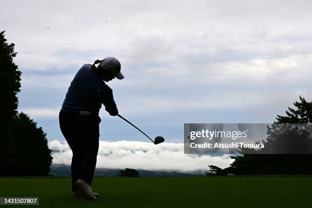 Ai Suzuki of Japan hits her tee shot on the 8th hole during the rest of the first round of the Stanley Ladies Honda Golf Tournament at Tomei Country...