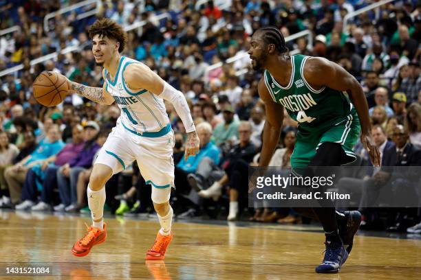 LaMelo Ball of the Charlotte Hornets drives to the basket against Noah Vonleh of the Boston Celtics during the second quarter of the game at...