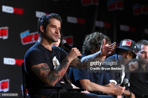 Tyler Posey speaks onstage at Teen Wolf: The Movie panel during New York Comic Con 2022 on October 07, 2022 in New York City.