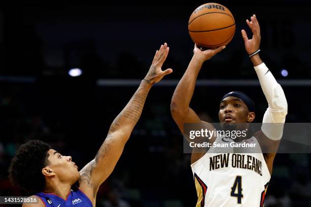 Devonte' Graham of the New Orleans Pelicans shoots over Killian Hayes of the Detroit Pistons during the first quarter of of an NBA preseason game at...