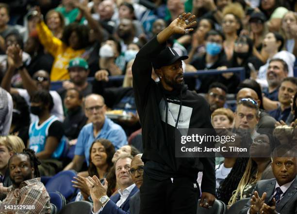 Former Charlotte Hornets' player Kemba Walker attends the game between the Charlotte Hornets and the Boston Celtics at Greensboro Coliseum Complex on...