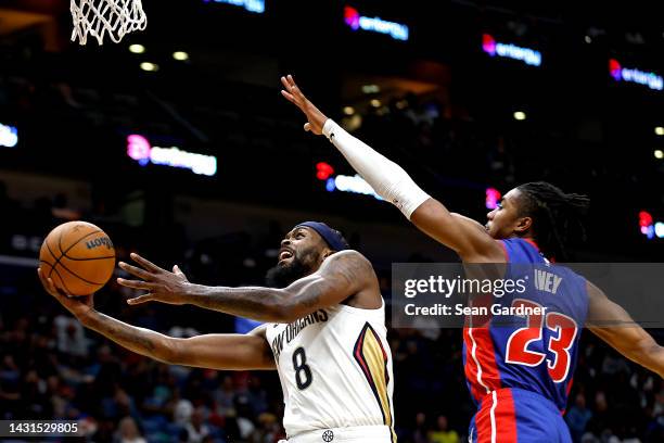 Naji Marshall of the New Orleans Pelicans shoot over Jaden Ivey of the Detroit Pistons during the second quarter of of an NBA preseason game at...