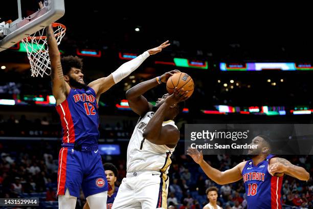 Zion Williamson of the New Orleans Pelicans shoots dover Isaiah Livers of the Detroit Pistons during the second quarter of of an NBA preseason game...