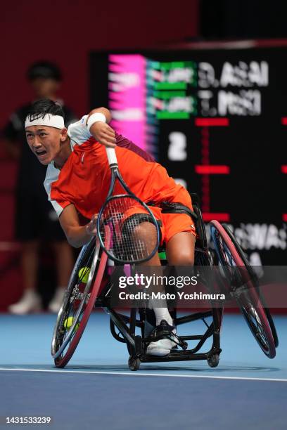 Tokito Oda of Japan competes against Daisuke Arai and Takuya Miki of Japan during the Wheelchair Doubles Final match on day Five of the Rakuten Japan...